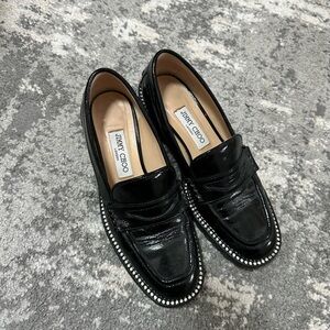 Jimmy Choo Black and Silver loafer with rhinestone Detailing
